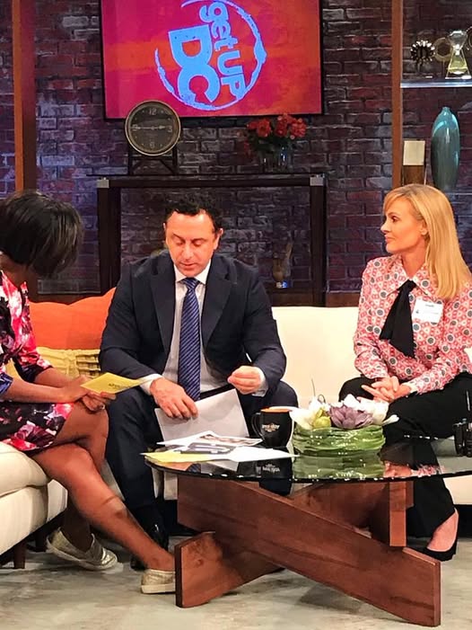 Andrea Rodgers with Dr. George Bitar of the Bitar Cosmetic Surgery Institute before the segment with TV host Markette Sheppard on Get Up DC, a television appearance Andrea arranged.